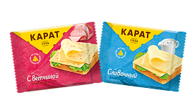 Сыр плавленый ломтиками КАРАТ с ветчиной/сливочный 0,13 кг